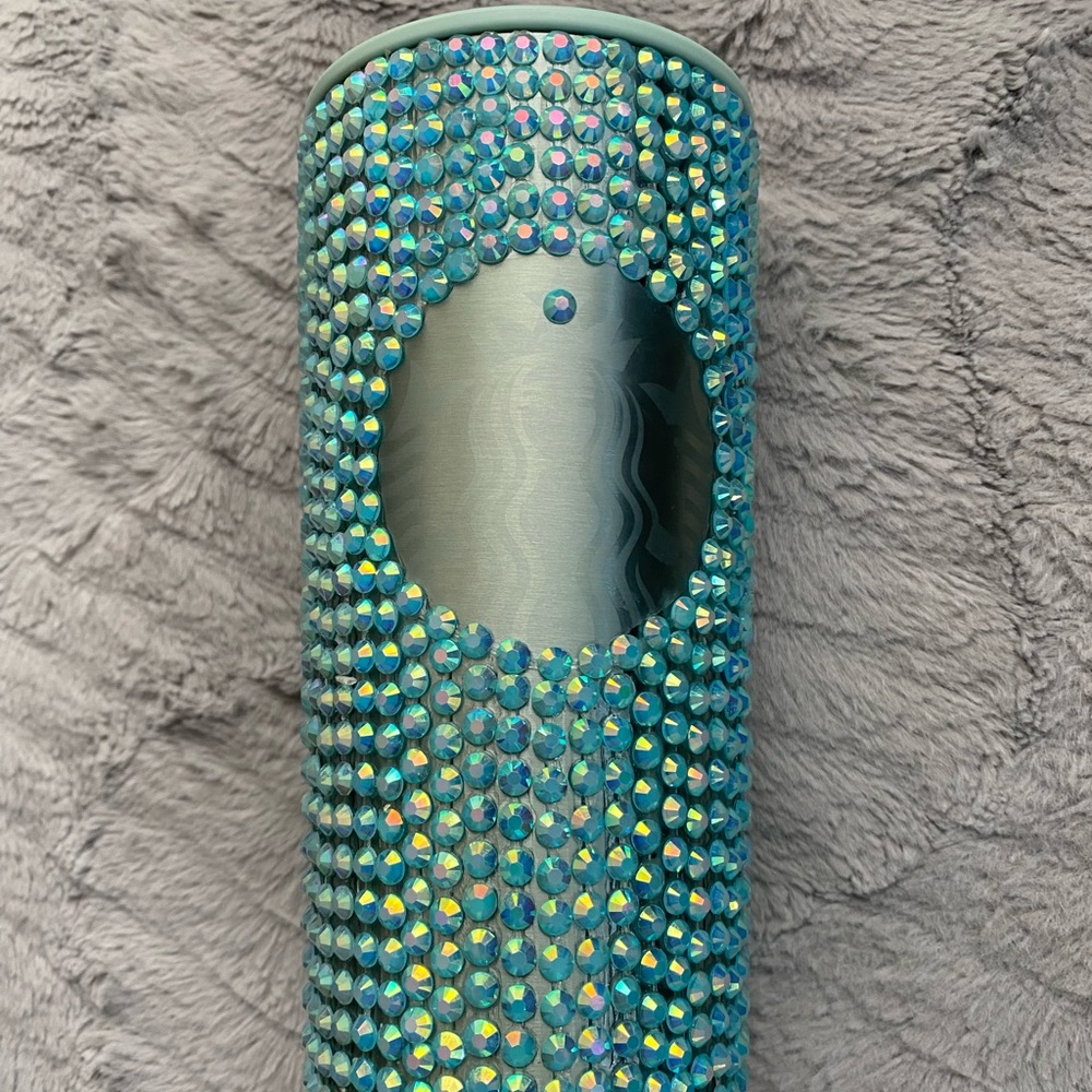 New Starbucks cup full of stones